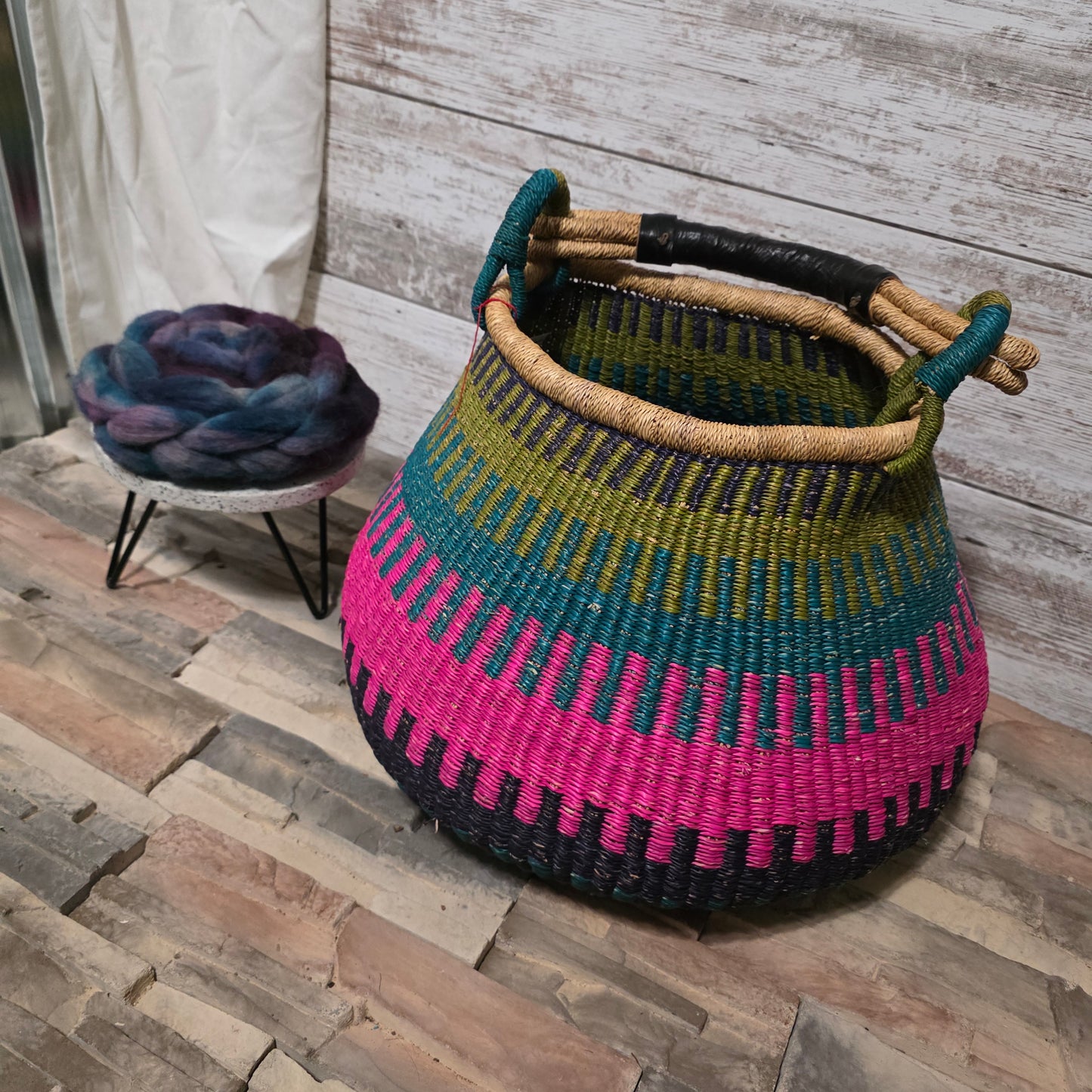 Dorset Roving in Deep Puple with hints of blue, pink, and teal