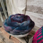 Dorset Roving in Deep Puple with hints of blue, pink, and teal