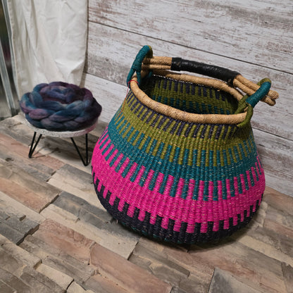 Dorset Roving in Deep Puple with hints of blue, pink, and teal